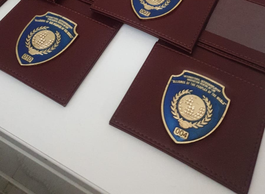 Alliance member badge in its leather case